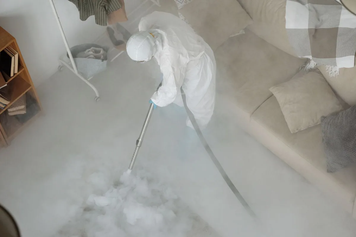 Biohazard cleanup technician in protective equipment, North Wales, PA